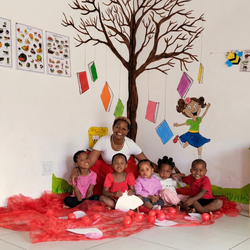 Teacher with children in classroom